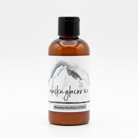 Alaska Glacier Ice premium beeswax lotion with mountain graphic and text.