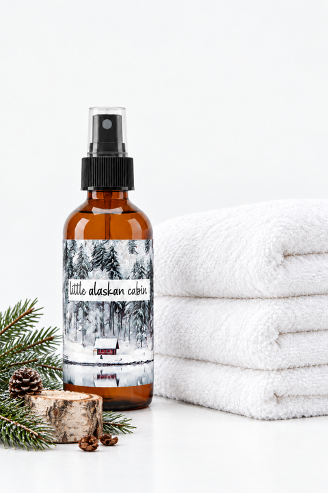 "Little Alaskan Cabin linen and room mist in amber spray bottle with snowy winter forest label, made in Alaska, Grey Fox Candles"