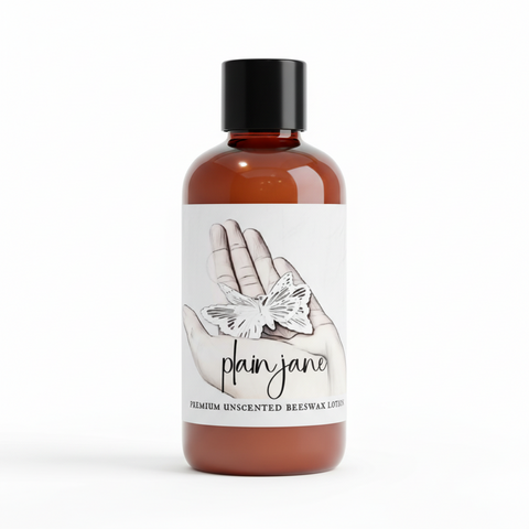 Hand holding a butterfly with 'plain jane' trial size lotion, branding and product details on a white background.