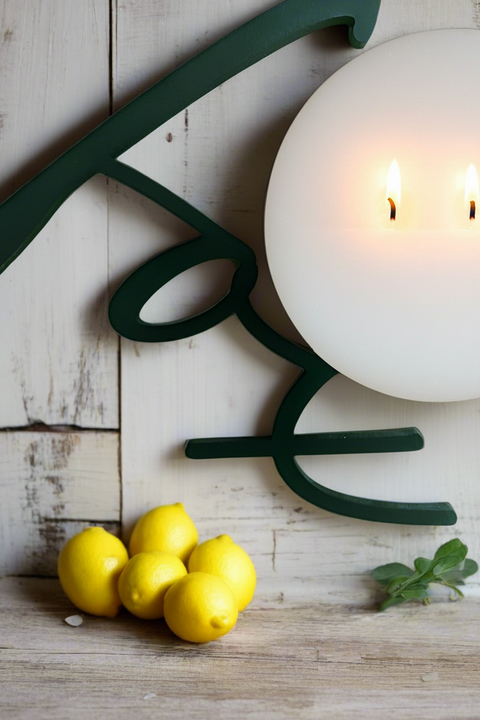 two wicks lit, text says FOX, whole lemons grouped together and a single mint sprig
