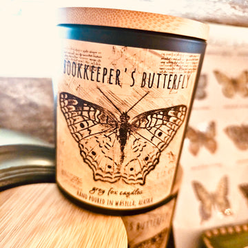 bookkeeper's butterfly, nostalgic, library, cozy, watercolor art, grey fox candles, made in alaska, alaska made