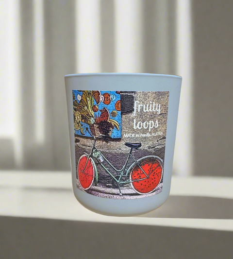 12 oz glass candle jar with bicycle design and 'fruity loops' text on a light background
