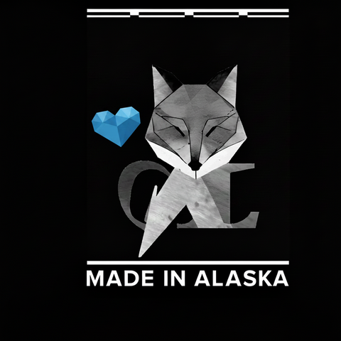Geometric fox design with 'Made in Alaska' text on a black background