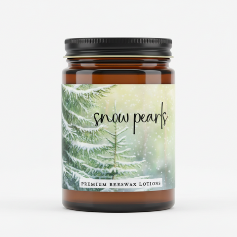 snow pearls premium beeswax lotions with a snowy tree background.