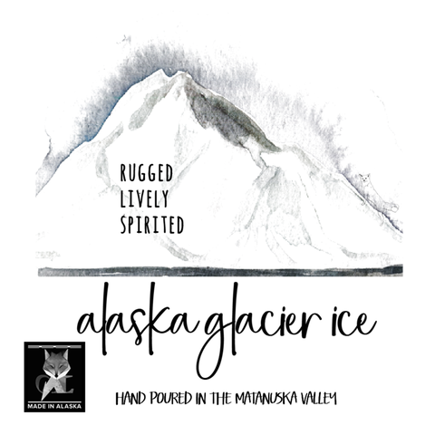 Alaska Glacier Ice advertisement with a mountain graphic and text.