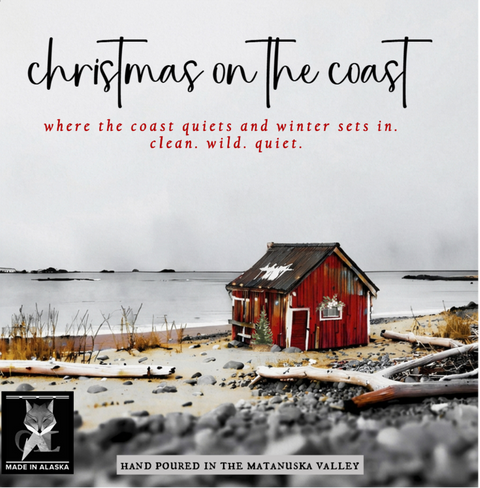Album cover for 'Christmas on the Coast' featuring a small red cabin on a coastal beach with the text 'where the coast quiets and winter sets in. clean.