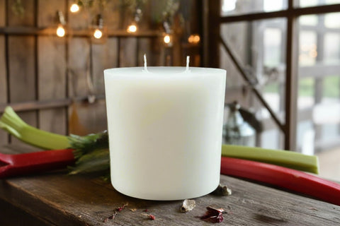 A white, pillar-shaped candle refill with multiple wicks, designed to fit inside a 12oz Grey Fox Candle AURA GLASS JAR.