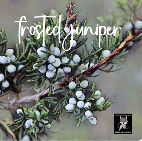 Decorative wreath with 'frosted juniper' text and a brand logo on a textured background.