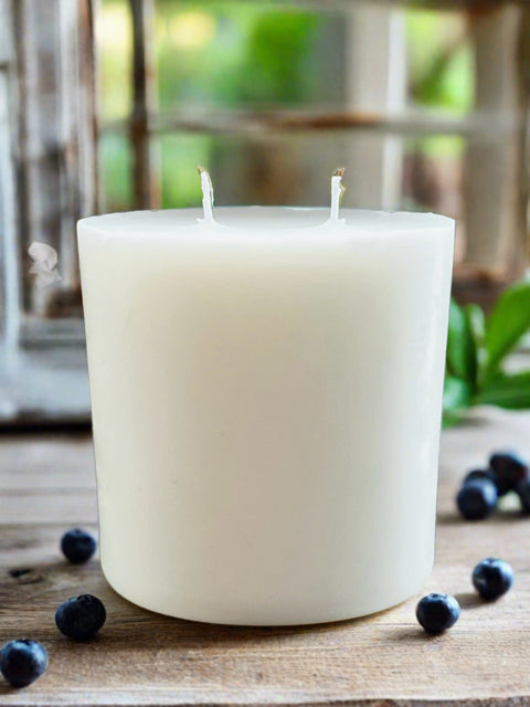 A white, pillar-shaped candle refill with multiple wicks, designed to fit inside a 12oz Grey Fox Candle AURA GLASS JAR.