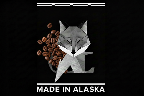 Grey Fox Candles Made in Alaska brand graphic featuring geometric fox head surrounded by roasted coffee beans on black background