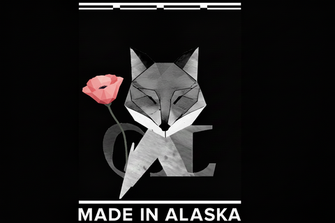 Geometric fox design with a pink flower on a black background, featuring 'Made in Alaska' text.