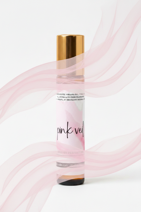 A roll-on perfume oil packaging label for 'pink veil' by Grey Fox Candles, featuring a light pink watercolor design on a white background with black text detailing ingredients and product info.