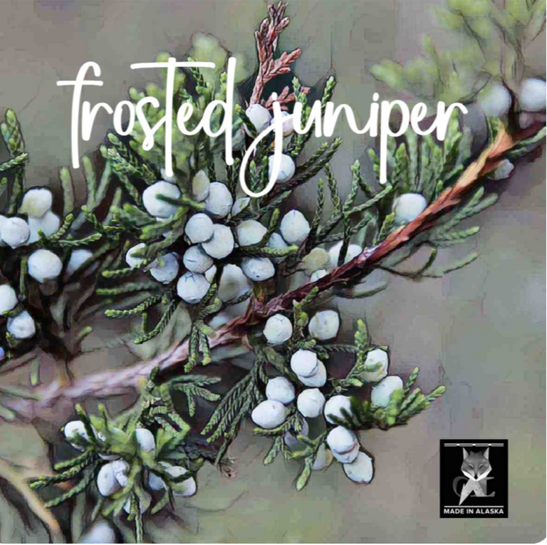 Decorative wreath with 'frosted juniper' text and a brand logo on a textured background.