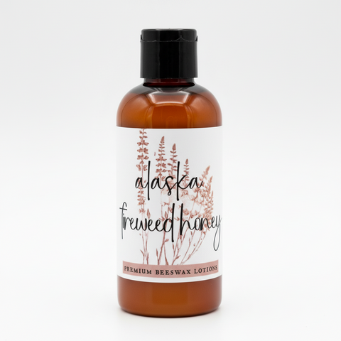 Alaska Fireweed Honey trial size lotion bottle on a white background, grey fox candles