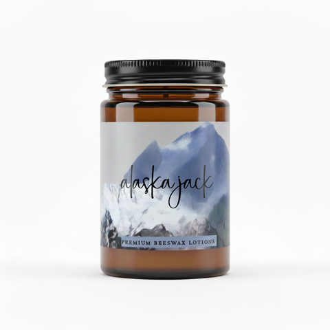 Alaska Jack premium beeswax lotions with mountain graphic and product name.