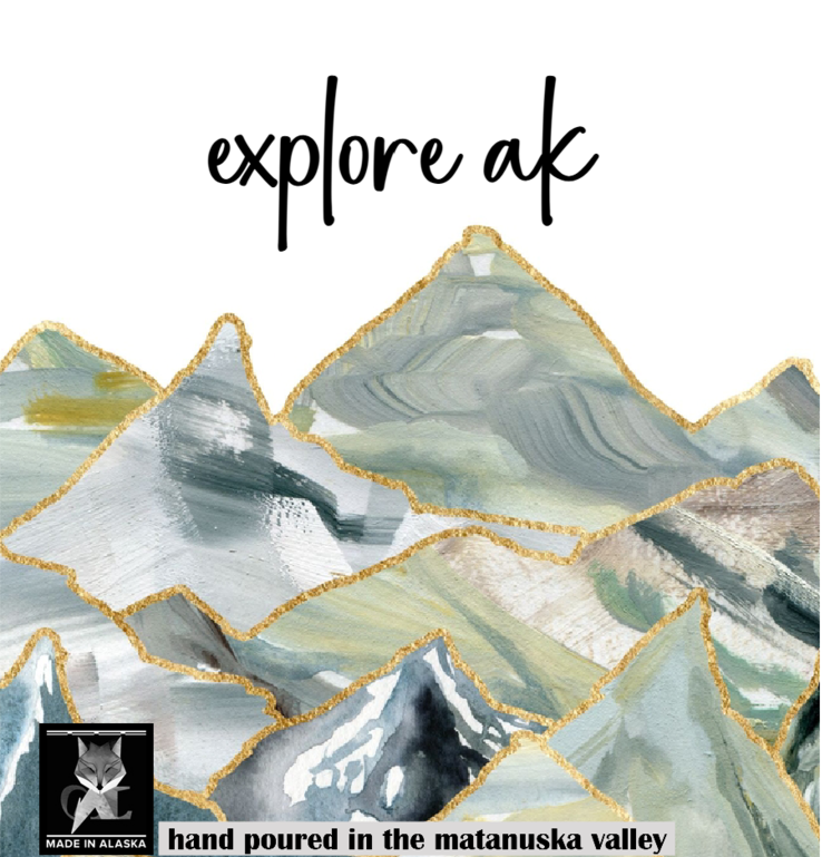 Artistic depiction of mountains with 'explore ak' text and grey fox logo in the corner.