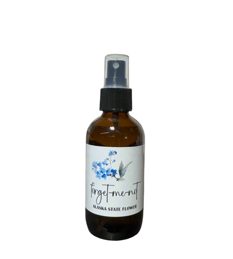 room spray bottle with a forget me not on a white background
