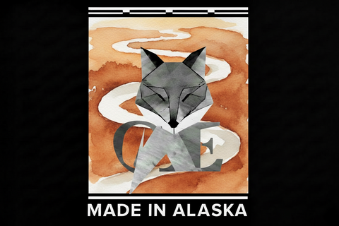 Illustration of a grey fox 'intertwined on an abstract copper river background with 'MADE IN ALASKA"