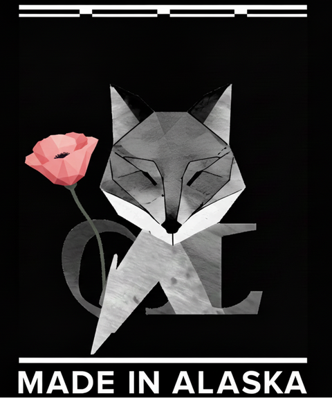 Geometric fox design with a pink flower and 'Made in Alaska' text on a black background