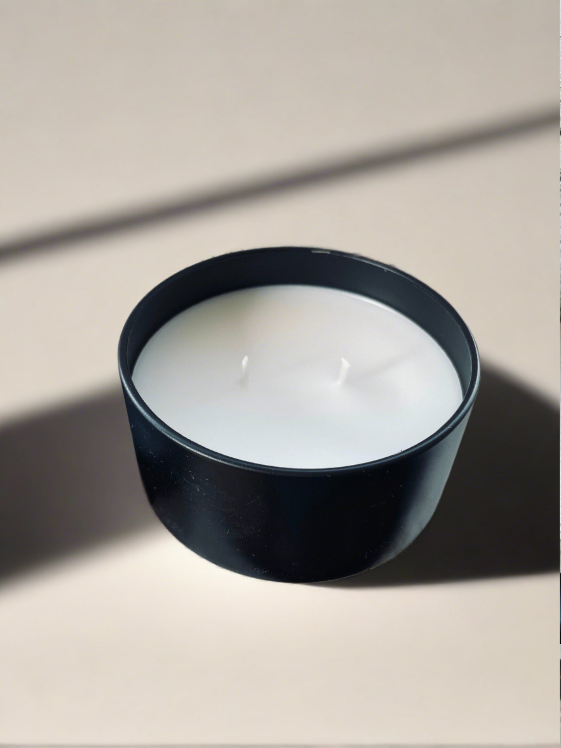 5 oz matte black discovery tin candle, grey fox candles