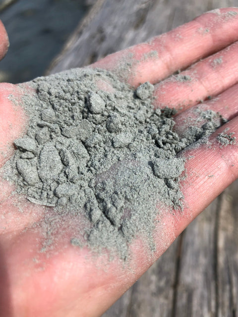dried glacier silt shown on hand
